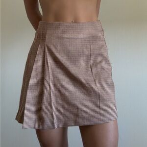 Asymmetrical pleated skirt